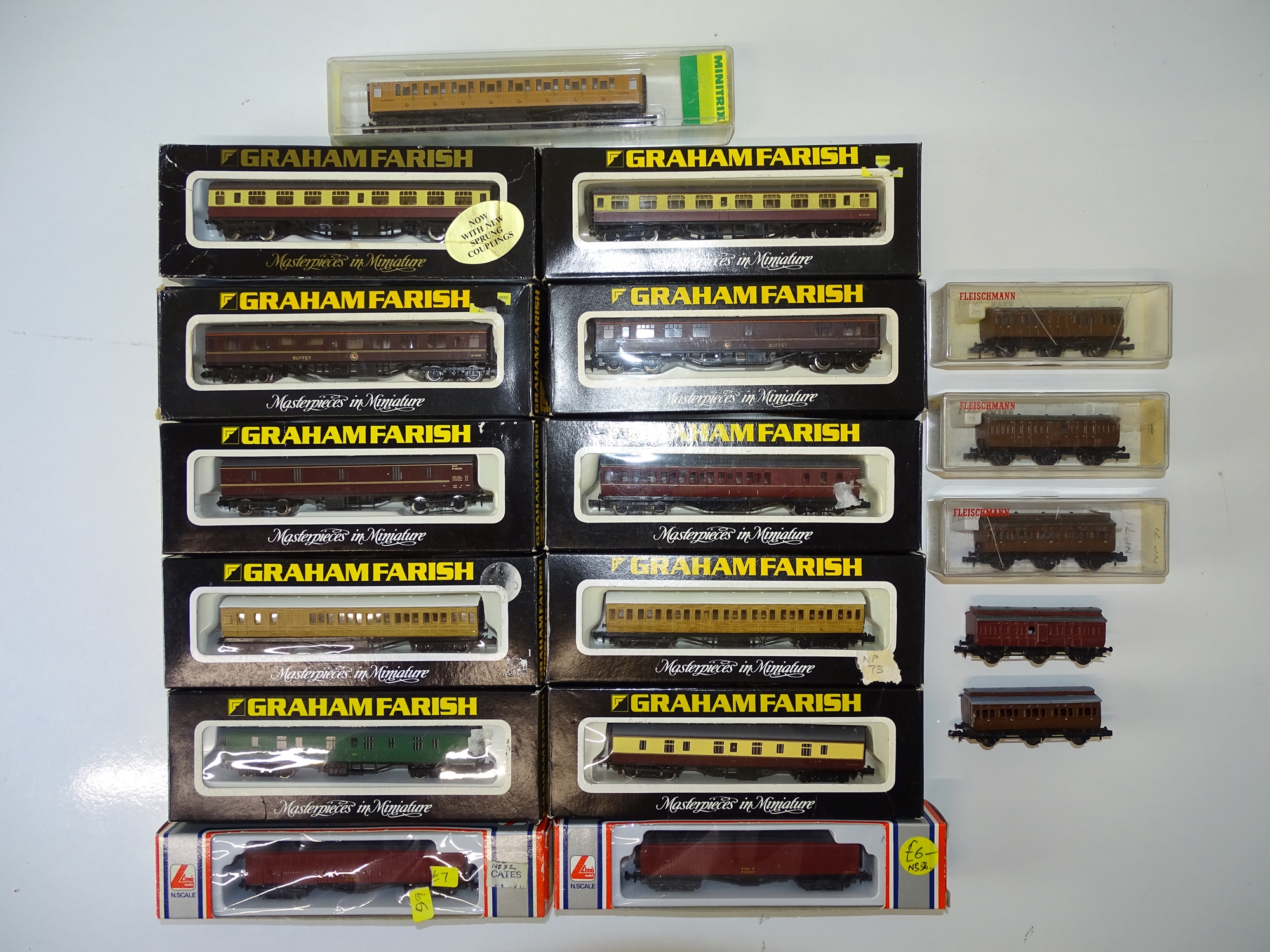 A mixed group of British Outline N Gauge coaches and luggage vans by GRAHAM FARISH and others to