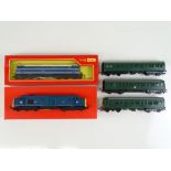 A group of OO Gauge locomotives by TRI-ANG-HORNBY comprising a Class 37 and a Class 31 (both