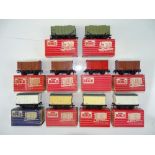A mixed group of HORNBY DUBLO vans and Grain wagons as lotted - G/VG in F/VG boxes (10)
