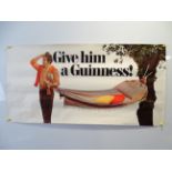 GUINNESS: 'Give him a Guinness!' (101.5 cm x 51 cm) with image of man and hammock - advertising