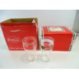 COCA-COLA: A set of 6 Coca-Cola glasses in box, together with a limited edition set of 6 Christmas