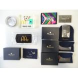 A quantity of MCDONALDS and COCA-COLA ephemera to include business card holders, wallets, luggage