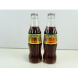 MCDONALDS / COCA-COLA - A pair of 1993 filled Coca-Cola bottles