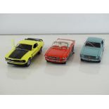A group of diecast cars in 1:24 Scale by FRANKLIN MINT: comprising a 1964 Ford Mustang, a 1964