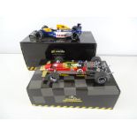 A pair of 1:18 scale Formula 1 cars by GRAND PRIX CLASSICS - G/VG in G/VG boxes (2)