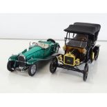 A pair of FRANKLIN MINT diecast cars comprising a 1:24 scale 1929 Bugatti Type 41 Royale Roadster (