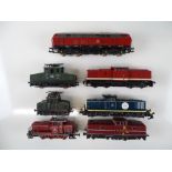 A group of unboxed German Outline diesel and electric locomotives by various manufacturers - F/G (
