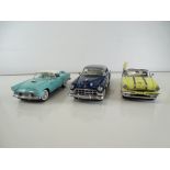 A group of diecast cars in 1:24 Scale by FRANKLIN MINT: comprising a 1955 Pontiac Starchief