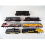 A group of unboxed American Outline diesel locomotives by various manufacturers - G/VG (7)