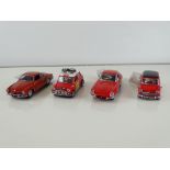 A group of diecast cars in 1:24 Scale by FRANKLIN MINT: comprising a Jaguar E-Type Coupé, a 1967