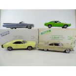 A group of diecast cars in 1:24 Scale by DANBURY MINT: comprising a 1960 Cadillac Eldorado Biarritz,