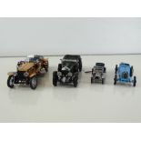 A group of diecast cars in 1:24 Scale by FRANKLIN MINT: comprising a 1921 Rolls Royce Silver Ghost