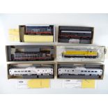 A group of American Outline diesel locomotives and Budd diesel railcars by ATHEARN - G in F/G