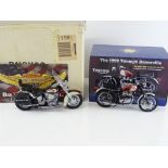 A pair of 1:10 Scale motorbikes by FRANKLIN MINT comprising a 1969 Triumph Bonneville and a Harley