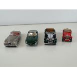 A group of diecast cars in 1:24 Scale by FRANKLIN MINT: comprising a 1948 MG TC Roadster, a 1938