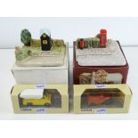 A pair of resin dioramas by CLASSIC HERITAGE COMPANY including a boxed CORGI van with each model -