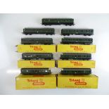 A quantity of TRI-ANG TT Gauge Class 104 DMU power cars, trailer cars and centre cars - some boxed -