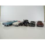 A group of diecast cars in 1:24 Scale by DANBURY MINT: comprising a 1959 Chevrolet Impala