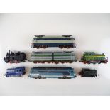 A group of unboxed European Outline diesel, steam and electric locomotives by various