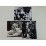 CARRY ON - A group of three signed BARBARA WINDSOR 10x8 photographs (one colour, two black/white)