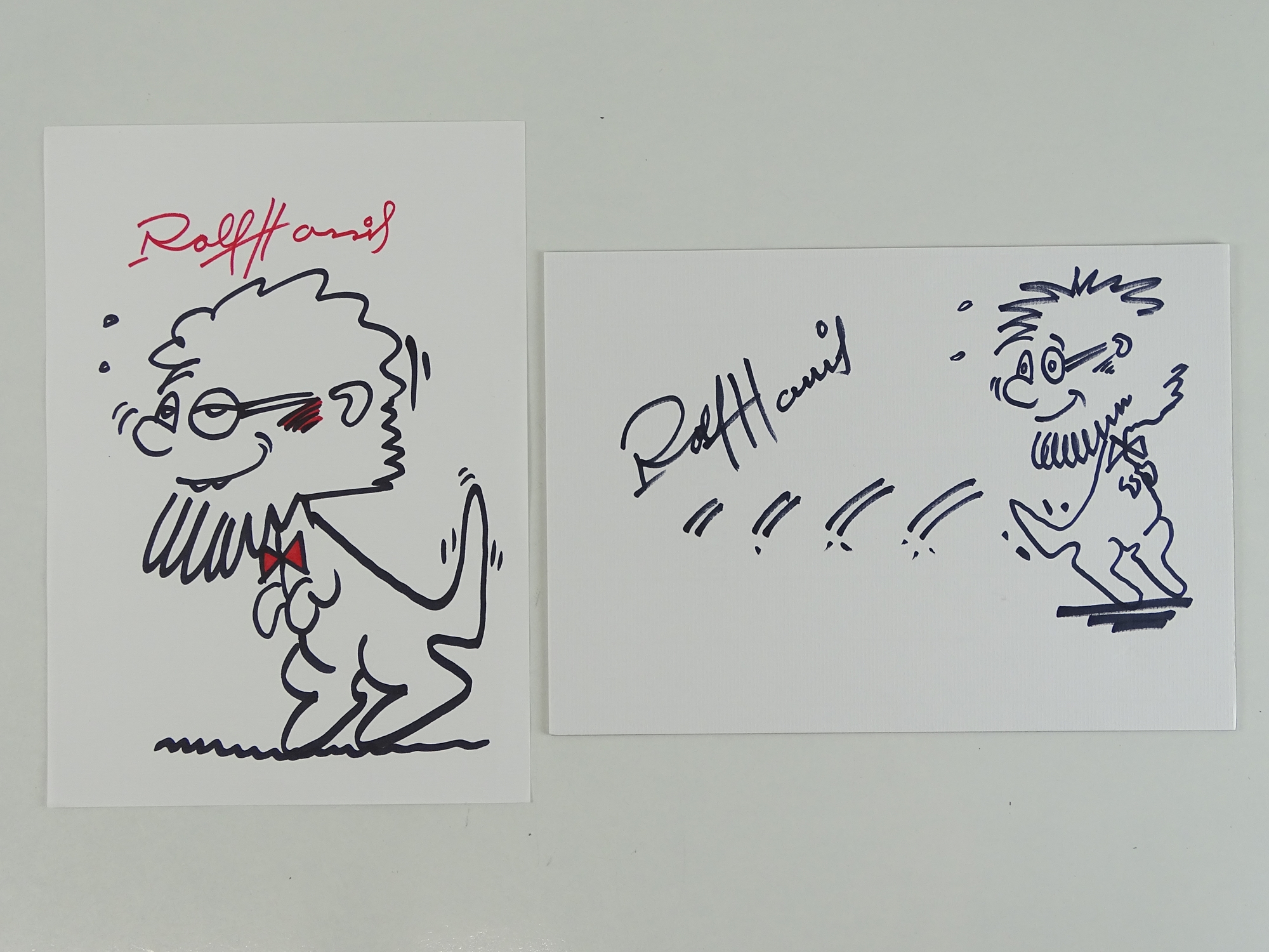 A pair of hand drawn Rolf-A-Roo sketches signed by ROLF HARRIS (2) these have been independently