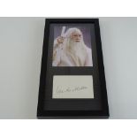 LORD OF THE RINGS: A framed and glazed IAN MCKELLAN display of photograph as Gandalf and signed card