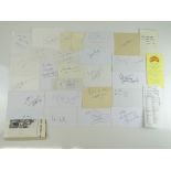 A mixed group of autographs collected on notes, receipts, envelopes and other paperwork, to include: