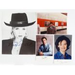 A group of four signed items comprising: KIM WILDE (singer) 10 x 8 black/white photograph, BOB