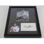 APOLLO 11: A framed and glazed BUZZ ALDRIN display of 2 X photographs together with a signed
