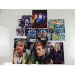DR WHO: A selection of photographs comprising: (16x12, 12x8 (2), 10x8) together with a magazine