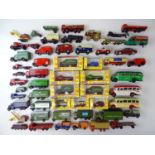 A large quantity of mixed boxed and unboxed diecast vehicles mostly 1:76 scale - F/VG in G boxes (