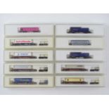 A group of MARKLIN Z Gauge German Outline Rollende Land Strasse (rolling road) lorry transport