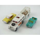 A mixed lot of DINKY and CORGI comprising: DINKY 154 Ford Taunus; CORGI 31 Safari Set -Land Rover