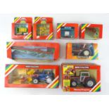 A group of BRITAINS agricultural models including tractors and farm machinery - G/VG in F/G boxes (