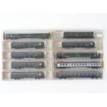 A group of N Gauge German Outline passenger coaches by FLEISCHMANN mostly in DB Green livery - VG in