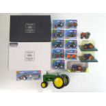 A group of diecast tractor models to include a UNIVERSAL HOBBIES 1:16 scale Fordson E27N 70th