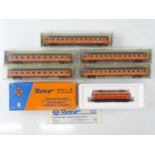 A group of ROCO N gauge Austrian outline rolling stock comprising a BR1044 electric locomotive and
