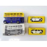 A small group of diecast vehicles comprising two VW Beetles by METOSUL (one with paint issues) and a