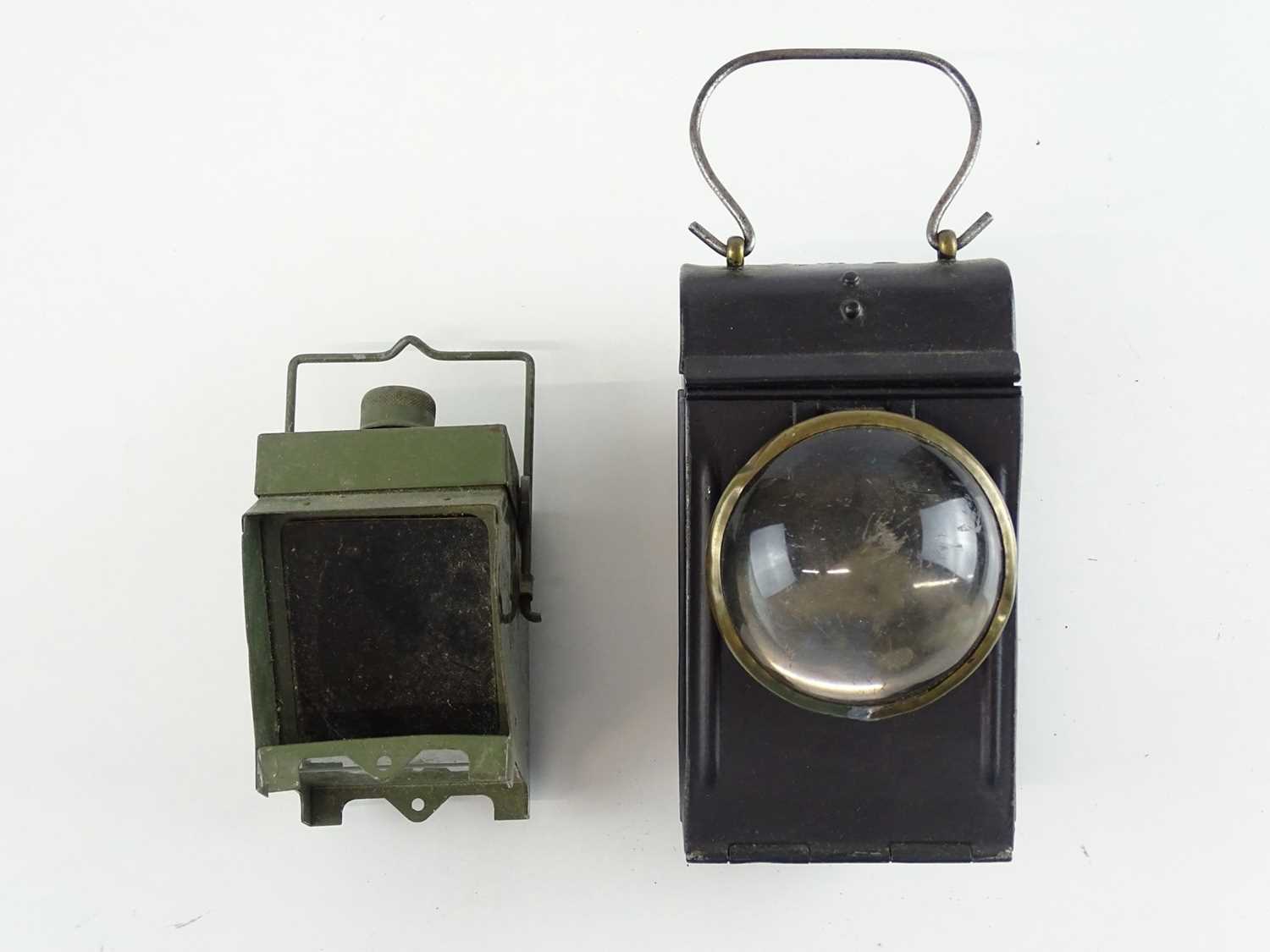 A pair of Railway hand lamps - one marked LMS, the other unmarked (2)