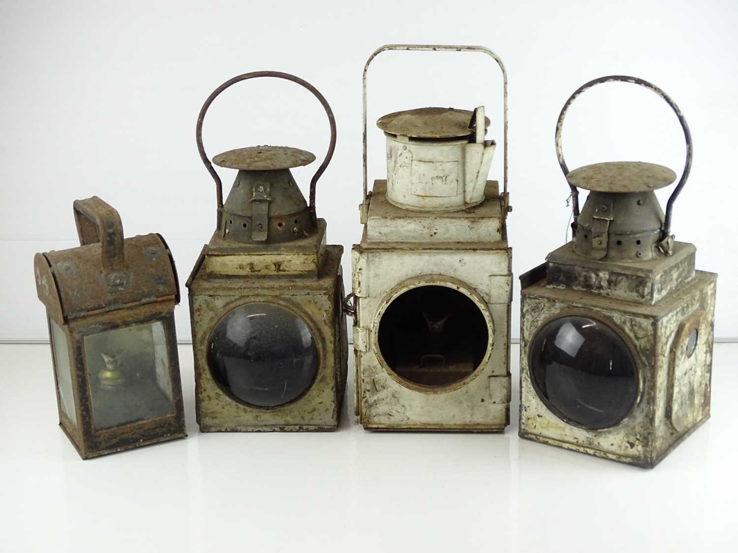 A group of railway tail and hand lamps (4)