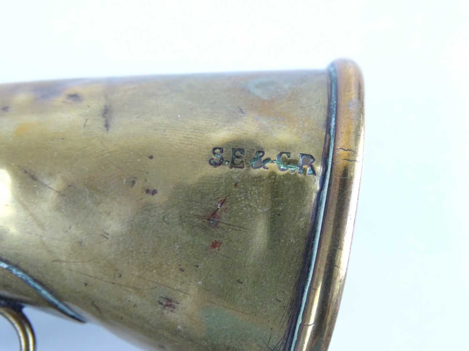 A South Eastern and Chatham Railway 'Look Out' armbadge with strap together with brass warning - Image 2 of 2