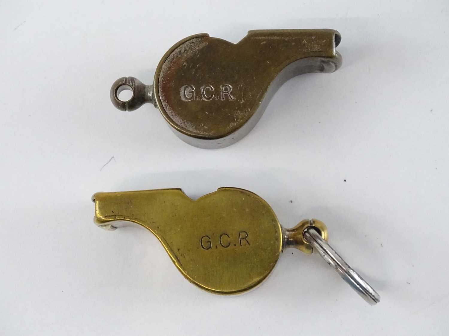 A group of Thunderer Patent whistles comprising two brass and one nickel plated example - all - Image 2 of 2