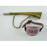 A South Eastern and Chatham Railway 'Look Out' armbadge with strap together with brass warning