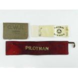 A pair of armbands comprising: a Pilotman band and a North Eastern Railway Service Band - together