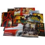 A mixed selection of rolled UK Quad and UK One sheet film posters for various action films to