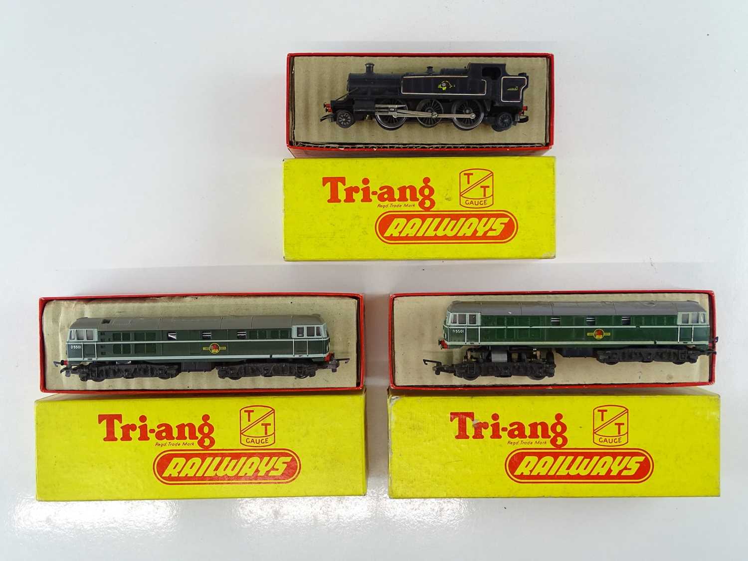 A group of TRI-ANG TT Gauge locomotives comprising a Prairie tank steam loco and 2 x Class 31 diesel