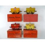 A group of HORNBY SERIES O Gauge pre-war tank wagons comprising Esso, BP and Pratts examples - G