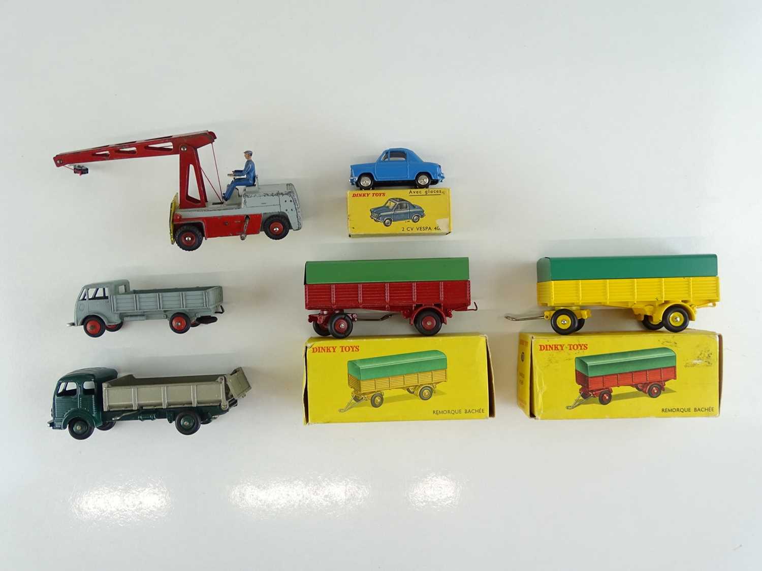 A mixed group of FRENCH DINKY items including boxed and unboxed lorries, trailers etc. - F/G in F/