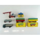 A mixed group of FRENCH DINKY items including boxed and unboxed lorries, trailers etc. - F/G in F/