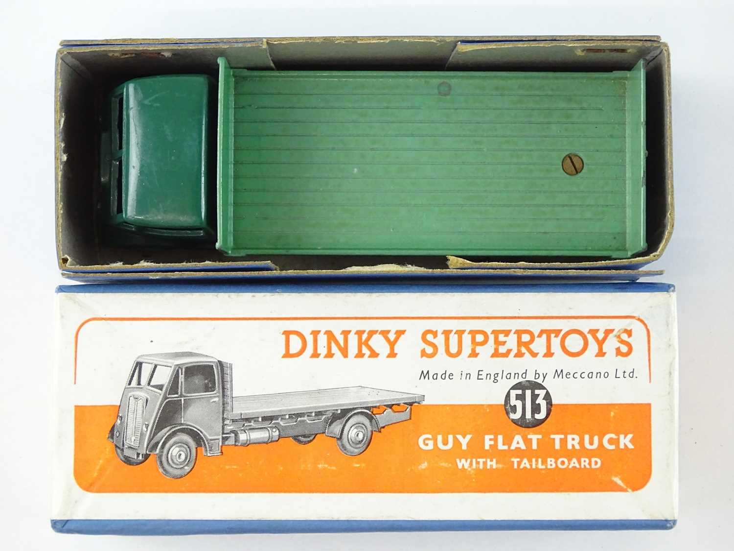 A DINKY Supertoys 513 Guy Flat Truck with Tailboard - dark green cab and chassis and mid-green - Image 2 of 5